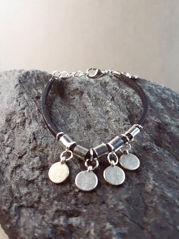 Silver Coins and Black Leather