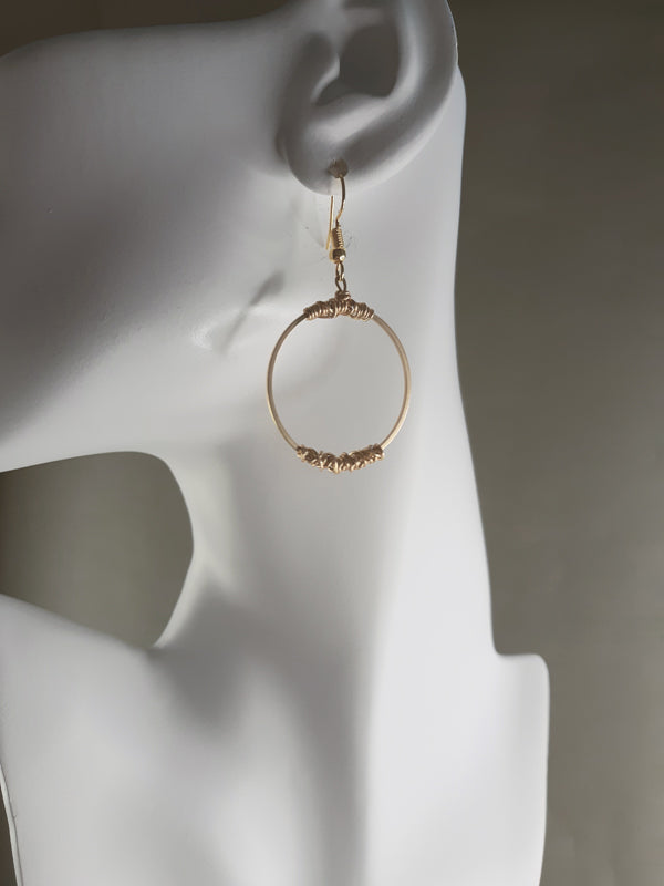 Gold Wire Loops - Brushed gold loops with wire trim.