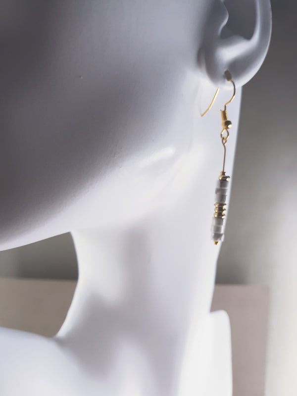 White Marble - White marble faceted beaded drop earring with gold trims.