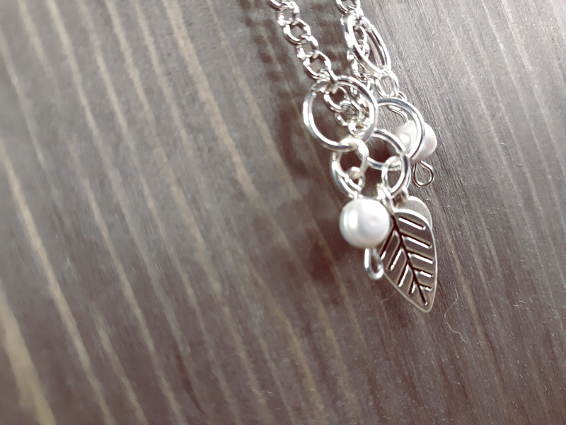 Long Silver Charm Necklace with Silver Leaf, Brushed silver tag and Light Grey Pearls